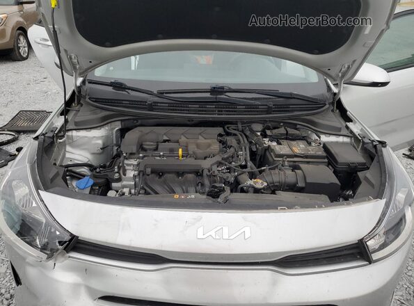 3KPA24AD0PE618654 2023 KIA RIO Серебряный Вид задней части салона
