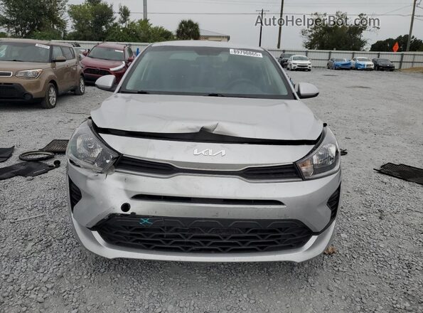 3KPA24AD0PE618654 2023 KIA RIO Серебряный Вид спереди