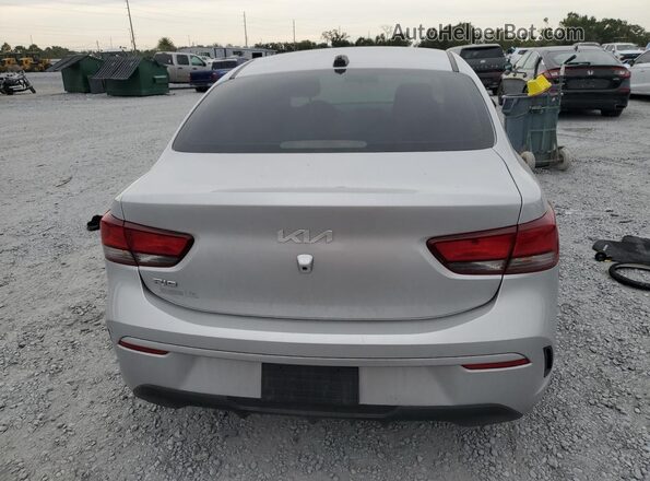3KPA24AD0PE618654 2023 KIA RIO Серебряный Вид сзади