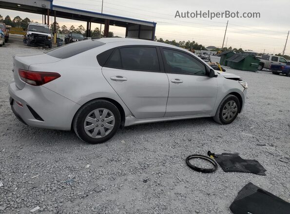 3KPA24AD0PE618654 2023 KIA RIO Серебряный Задняя правая четверть