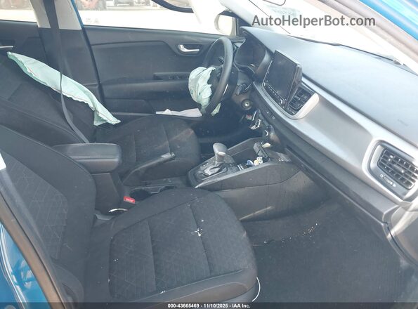 3KPA24AD2PE578013 2023 KIA RIO Синий Вид салона спереди
