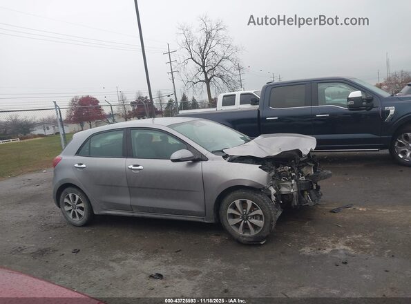 3KPA25AD5PE511427 2023 KIA RIO 5-DOOR Серый Вид задней части салона