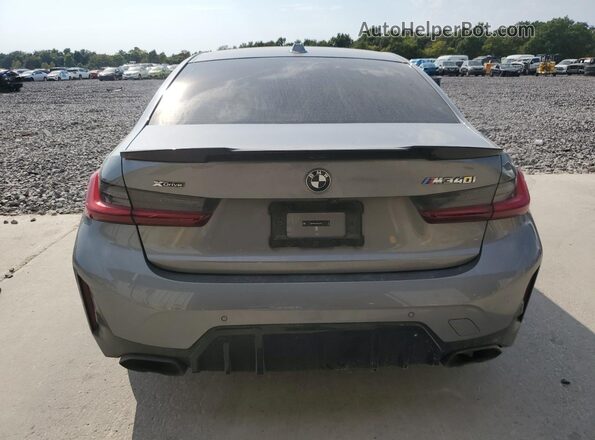 3MW49FF05P8D52635 2023 BMW M3 Серебряный Вид сзади