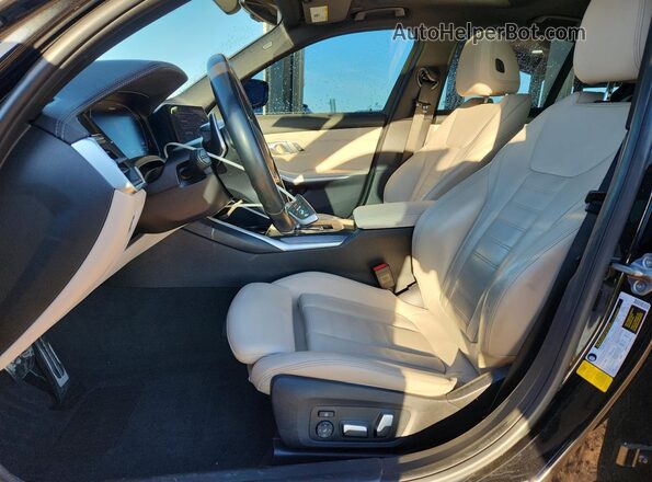 3MW5U7J04M8B55693 2021 BMW M3 Black Vista interior delantera