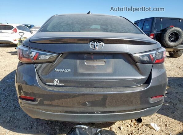 3MYDLBYV5KY505420 2019 TOYOTA YARIS Gray Vista trasera