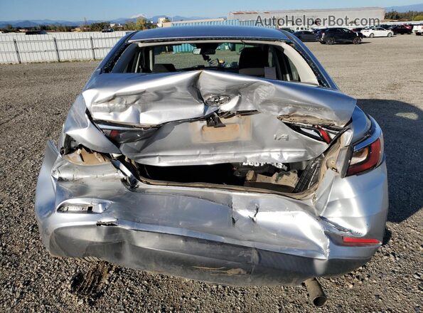 3MYDLBYV8JY322530 2018 TOYOTA YARIS Silver Rear view