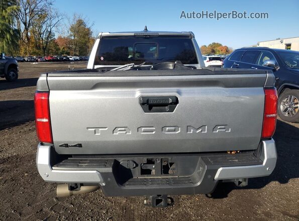 3TMLB5JN7RM004975 2024 TOYOTA LE Silver Rear view