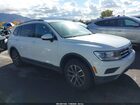 2020 Volkswagen Tiguan 2.0t Se/2.0t Se R-line Black/2.0t Sel White vin: 3VV2B7AX2LM069363