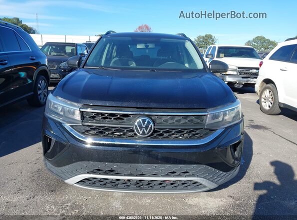 3VVCX7B2XNM015319 2022 VOLKSWAGEN TAOS Черный Вид панели приборов