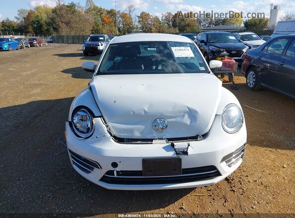 3VWJ17AT5HM618052 2017 VOLKSWAGEN BEETLE Белый Вид задней части салона