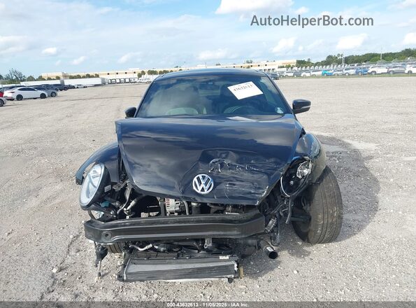 3VWJD7AT6JM711594 2018 VOLKSWAGEN BEETLE Черный Вид щитка приборов