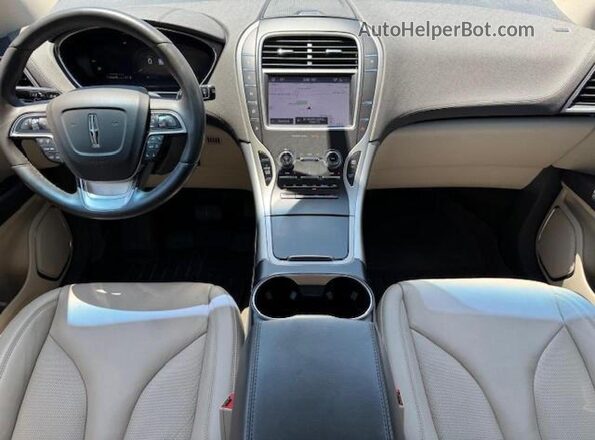 2LMPJ8J93LBL15854 2020 LINCOLN NAUTILUS Tan ხელსაწყოთა პანელის ხედი