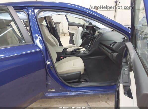 4S3GKAV63P3604906 2023 SUBARU IMPREZA Blue Vista interior delantera