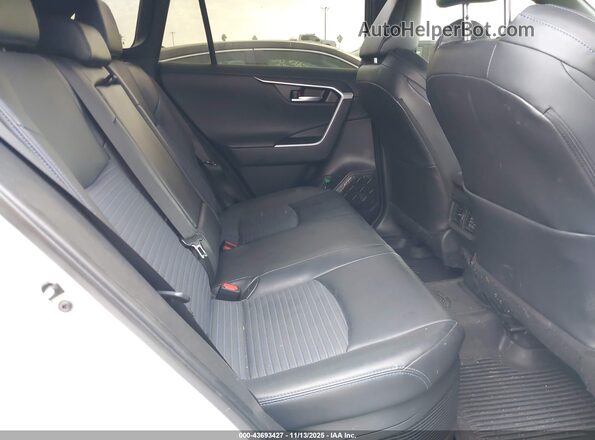4T3E6RFV4PU139341 2023 TOYOTA RAV4 HYBRID White Widok naklejki z numerem VIN