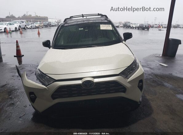4T3E6RFV5MU063091 2021 TOYOTA RAV4 HYBRID Белый Вид панели приборов