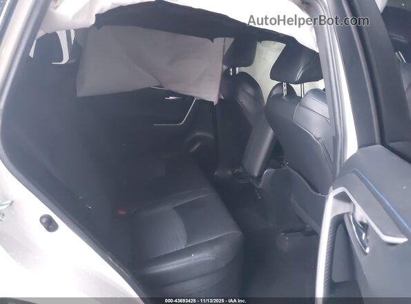 4T3E6RFV5MU063091 2021 TOYOTA RAV4 HYBRID Белый Вид наклейки с VIN-кодом