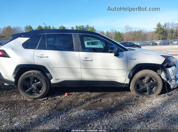 4T3E6RFV8MU061075 2021 TOYOTA RAV4 HYBRID White Вид задньої частини салону