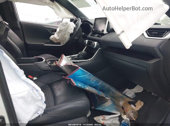 4T3E6RFV9MU027176 2021 TOYOTA RAV4 HYBRID White Вид салону спереду