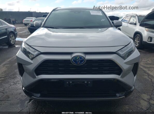 4T3T6RFV6NU079129 2022 TOYOTA RAV4 HYBRID Серебряный Вид задней части салона