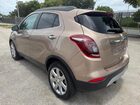2019 Buick Encore Essence Желто-коричневый vin: KL4CJCSM3KB734676