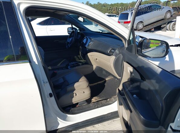 5FNYF6H01KB024451 2019 HONDA PILOT Белый Вид салона спереди
