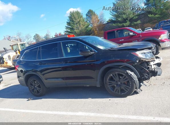 5FNYF6H20MB044467 2021 HONDA PILOT Черный Вид задней части салона
