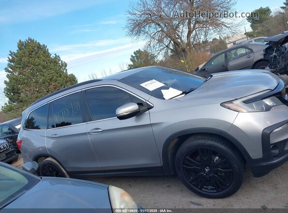 5FNYF6H27MB087459 2021 HONDA PILOT Серебряный Вид задней части салона