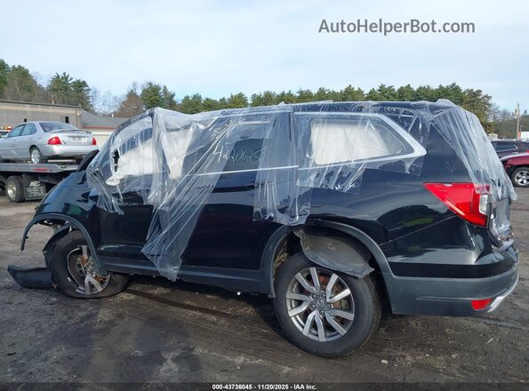 5FNYF6H55MB069844 2021 HONDA PILOT Черный Вид задней части салона