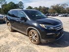 2017 Honda Pilot Touring Черный vin: 5FNYF6H93HB104602