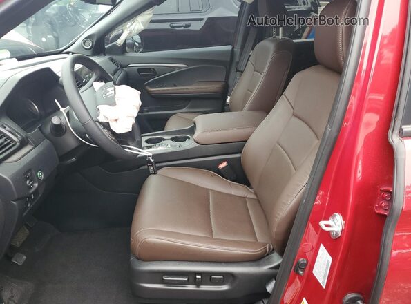 5FNYF8H55RB021988 2024 HONDA PASSPORT Красный Вид салона спереди
