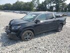2023 Honda Ridgeline Rtl Black vin: 5FPYK3F50PB047646