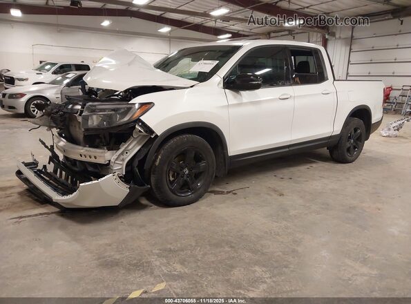 5FPYK3F86MB018352 2021 HONDA RIDGELINE White Vista tres cuartos delantera izquierda
