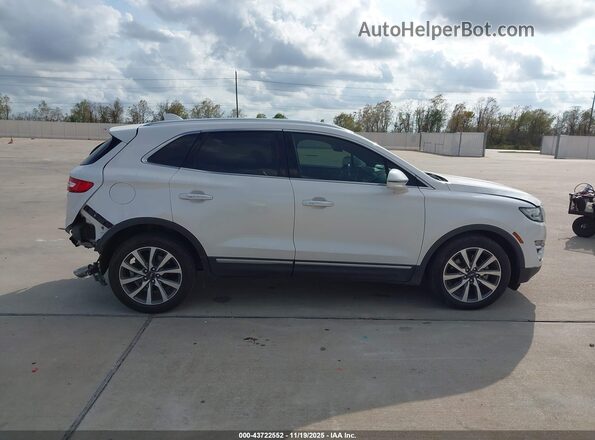 5LMCJ3C99KUL38880 2019 LINCOLN MKC Белый Вид задней части салона