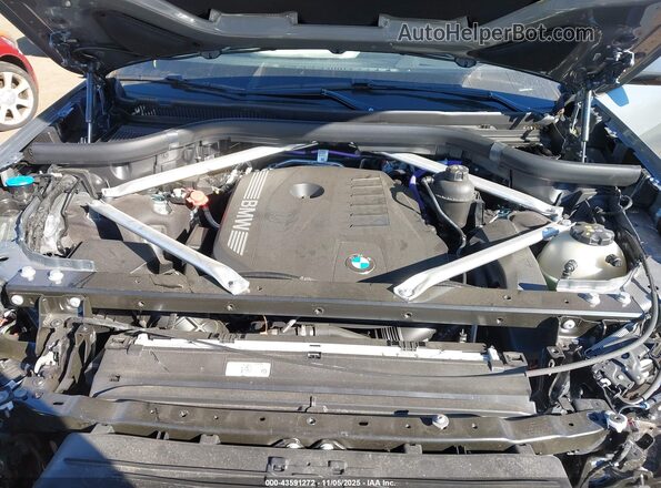 5UX23EM08R9V77437 2024 BMW X7 Gray Widok z tyłu