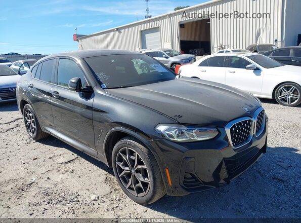 5UX33DT01P9P53175 2023 BMW X4 Черный Передняя правая четверть