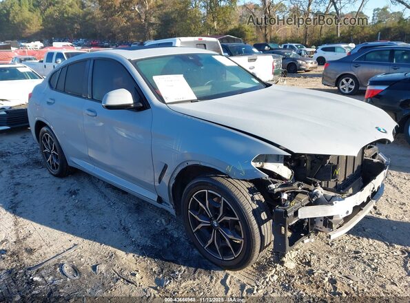 5UX33DT09P9P11689 2023 BMW X4 Серый Передняя правая четверть