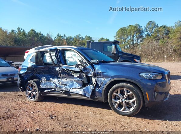 5UX43DP08N9M21200 2022 BMW X3 Синий Вид задней части салона