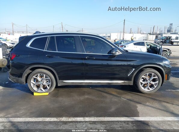 5UX43DP09N9J02131 2022 BMW X3 Black Widok wnętrza z tyłu