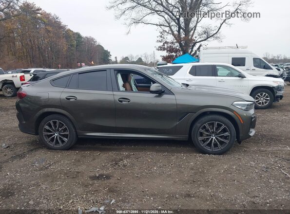 5UXCY6C05P9N67409 2023 BMW X6 Зеленый Вид задней части салона