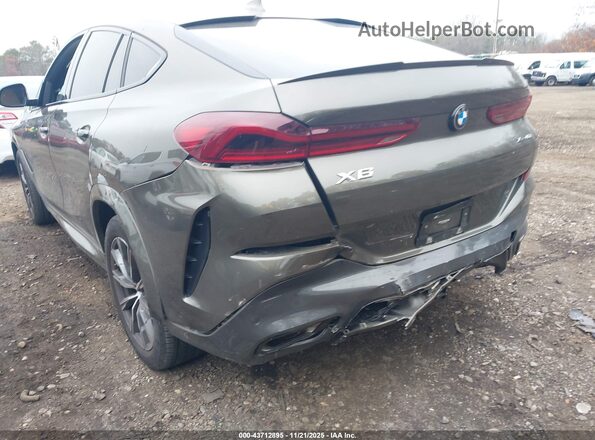 5UXCY6C05P9N67409 2023 BMW X6 Зеленый Вид спереди