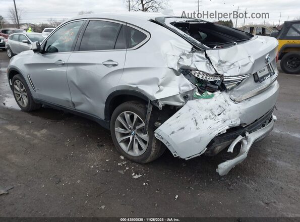 5UXKU2C53K0Z62875 2019 BMW X6 Silver Trasero izquierdo