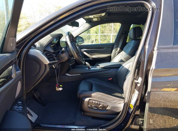 5UXKU6C58KLP60457 2019 BMW X6 Черный Вид салона спереди