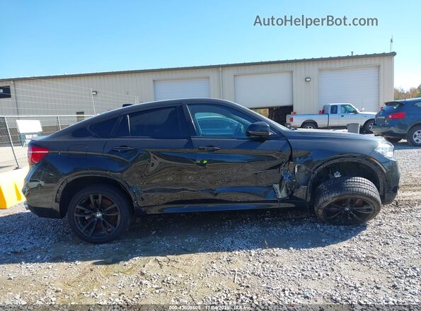 5UXKU6C58KLP60457 2019 BMW X6 Черный Вид задней части салона