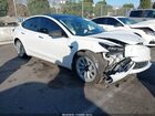 2022 Tesla Model 3 Long Range Dual Motor All-wheel Drive White vin: 5YJ3E1EB9NF137185