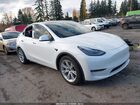 2020 Tesla Model Y Long Range Dual Motor All-wheel Drive White vin: 5YJYGDEE4LF057835
