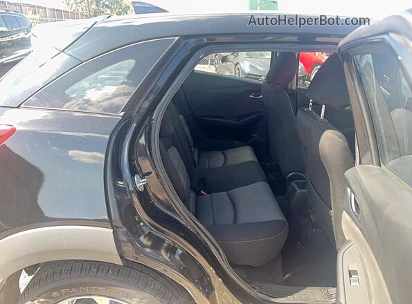 JM1DKBB71G0123172 2016 MAZDA CX-3 Черный Вид салона спереди