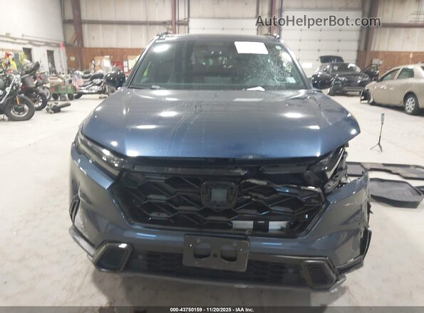 7FARS6H88RE044846 2024 HONDA CR-V HYBRID Синий Вид задней части салона