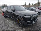 2023 Rivian R1t Adventure Quad Motor Large Pack Black vin: 7FCTGAAA3PN017789