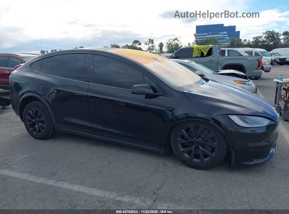 7SAXCBE59RF455887 2024 TESLA MODEL X Черный Вид задней части салона