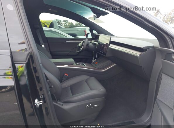 7SAXCBE59RF455887 2024 TESLA MODEL X Черный Вид салона спереди